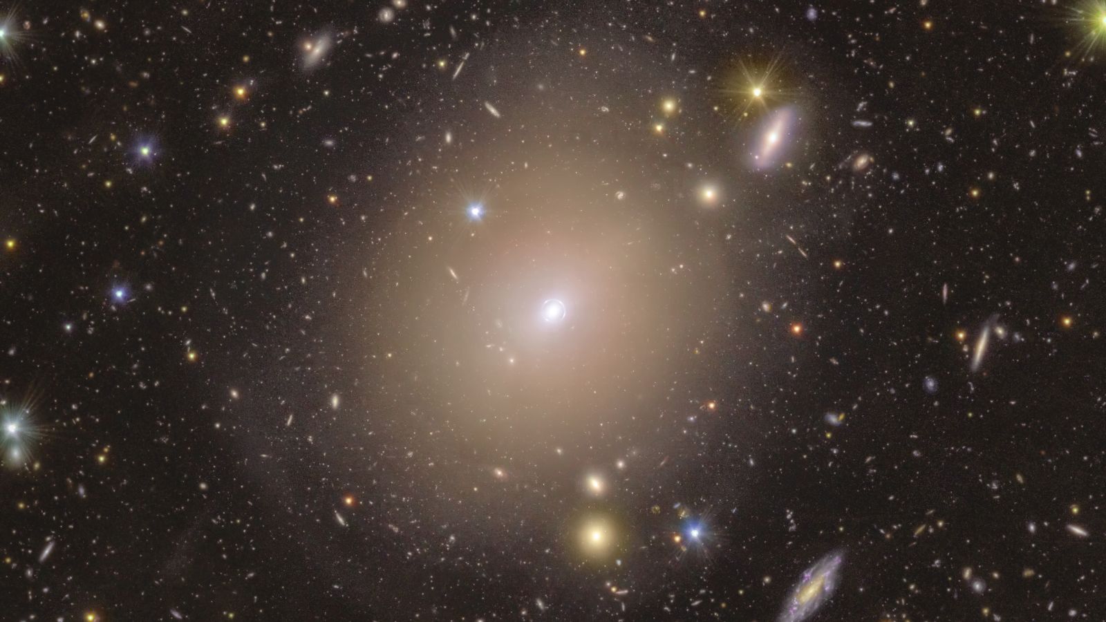 Euclid space telescope image of an Einstein ring around a foreground galaxy — discovered by an AI pipeline before any human noticed it